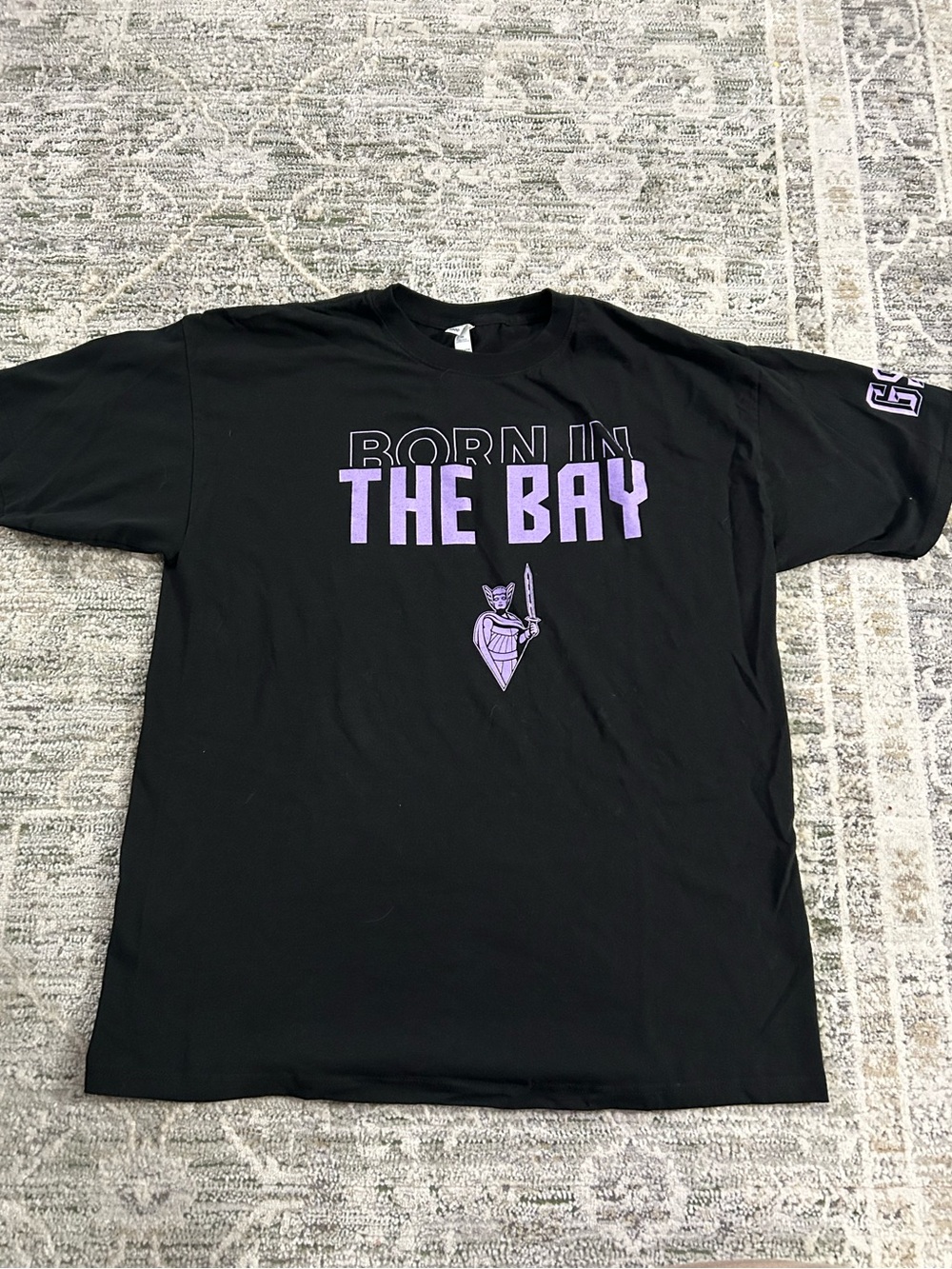 Valkyries Born in the Bay Black Tee with Purple Graphic